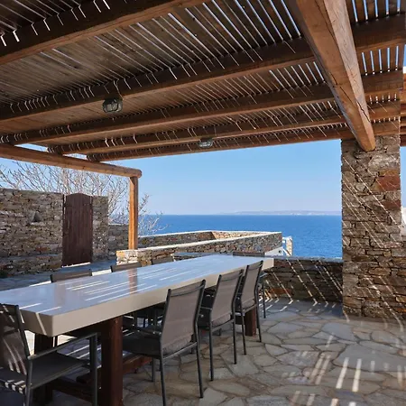 Stone With A Sea Water Swimming Pool And A Sea And Sunset View