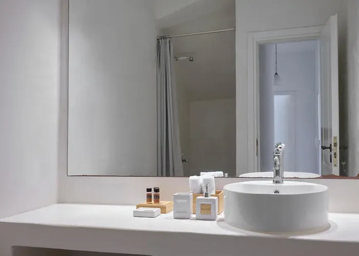 Stone With A Sea Water Swimming Pool And A Sea And Sunset View