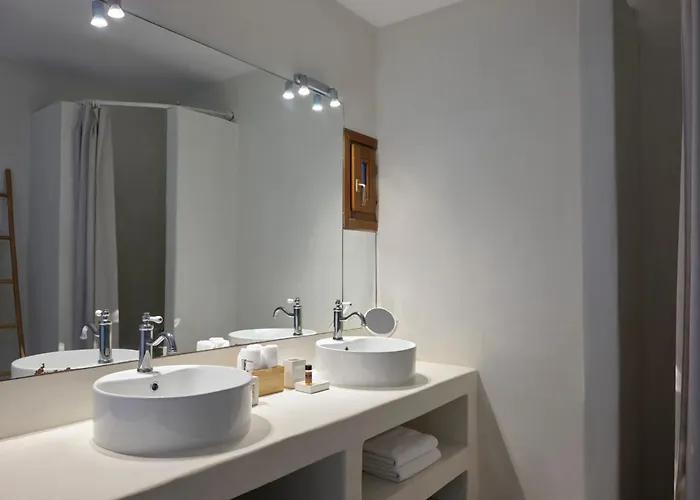 Stone With A Sea Water Swimming Pool And A Sea And Sunset View