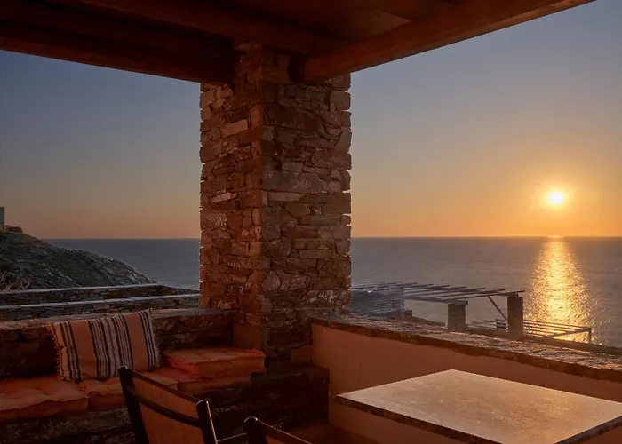 Stone With A Sea Water Swimming Pool And A Sea And Sunset View