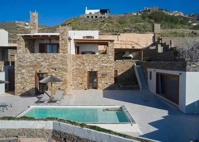 Stone With A Sea Water Swimming Pool And A Sea And Sunset View