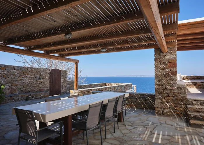 Stone With A Sea Water Swimming Pool And A Sea And Sunset View